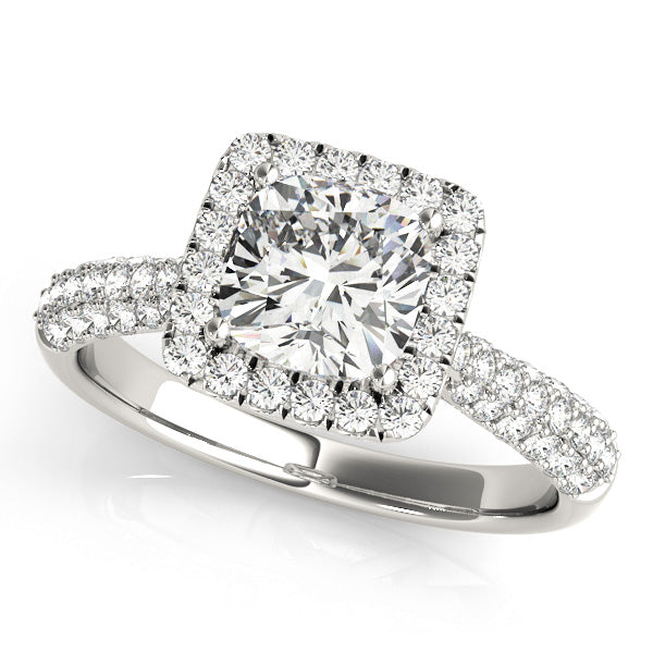 Halo engagement ring with 1CT Cushion Cut Lab Diamond, tapered pavé band and lattice gallery crafted in 14K White Gold