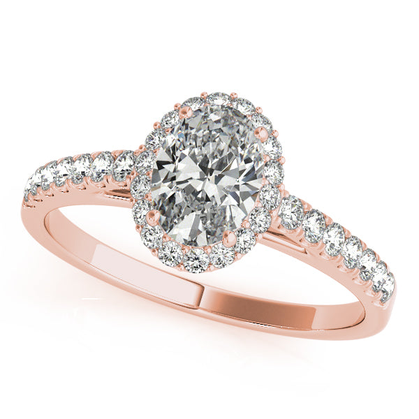 Oval engagement ring in 14K Rose Gold with 1CT lab diamond, pavé halo, and tapered band design