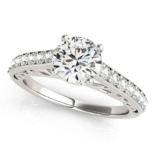 Split shank engagement ring featuring 1CT Round Lab Diamond with 14 pavé diamonds and scroll accents in 14K White Gold (VS1/F Color)