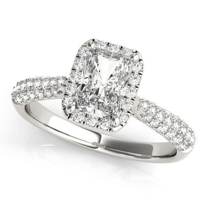 Emerald-cut engagement ring featuring 1CT Emerald Cut Lab Diamond, pavé halo and filigree gallery crafted in 14K White Gold