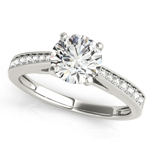 Channel-set engagement ring featuring 1CT Round Lab Diamond with 14 pavé side diamonds and milgrain band crafted in 14K White Gold