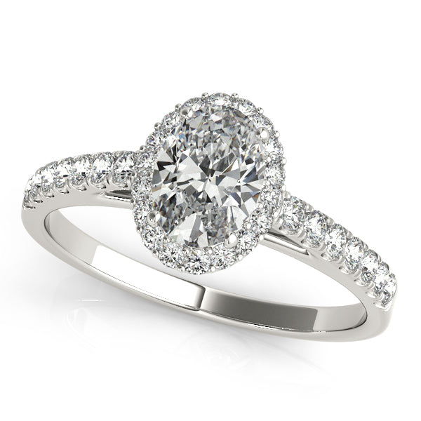 Oval-cut engagement ring with 1CT Oval Cut Lab Diamond, pavé halo, tapered band and timeless charm crafted in 14K White Gold